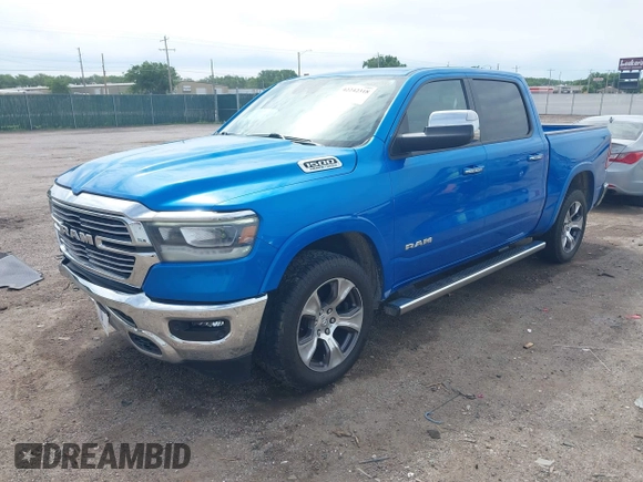 2021 Ram 1500 Laramie with VIN 1C6SRFJT1MN774879, listed as a IAAI auction lot 42242318 with 51,971 mi miles and . Bid and sale history available at DreamBid. Image 2.