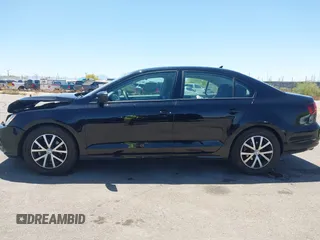 2016 Volkswagen Jetta Sedan 1.4T SE with VIN 3VWD67AJ8GM368642, listed as a IAAI auction lot 42087079 with 90,974 mi miles. Bid and sale history available at carsss.com. Image 14.