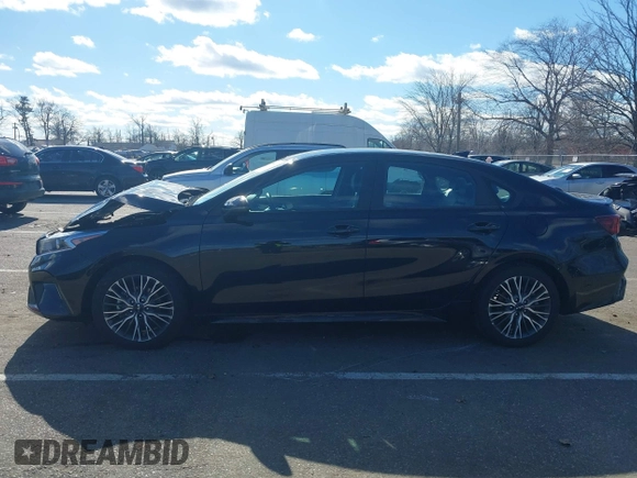 2023 Kia Forte GT-Line z VIN 3KPF54ADXPE580248, wystawiony jako IAAI lot #41601138 z przebiegiem 21 881 mil mil oraz . Historia ofert i sprzedaży dostępna na DreamBid. Obrazek 14.