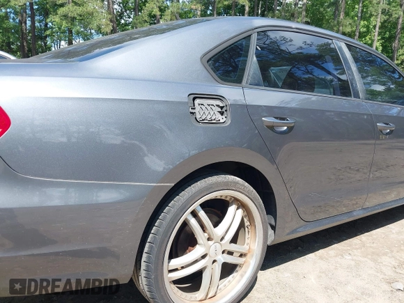 2014 Volkswagen Passat S with VIN 1VWAP7A37EC018693, listed as a IAAI auction lot 42463719 with 143,105 mi miles and . Bid and sale history available at DreamBid. Image 14.