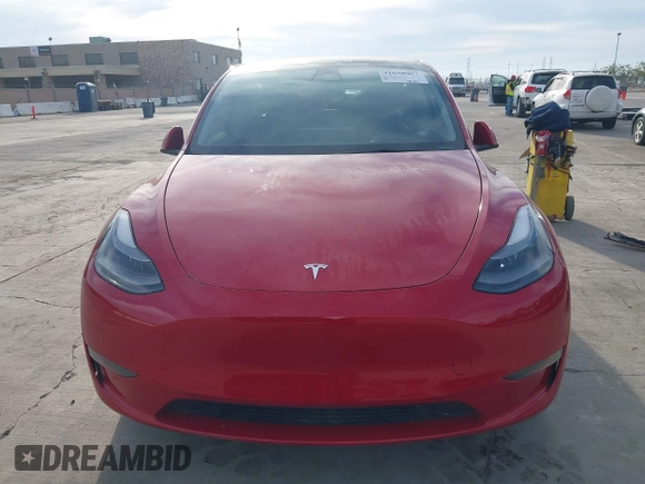 2023 Tesla Model Y Long Range with VIN 7SAYGAEE7PF713761, listed as a IAAI auction lot 41638067 with 46,089 mi miles and . Bid and sale history available at DreamBid. Image 12.