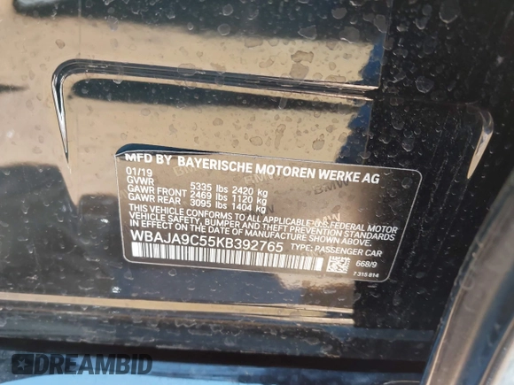2019 BMW 5 Series 530e iPerformance with VIN WBAJA9C55KB392765, listed as a IAAI auction lot 41748610 with 60,834 mi miles. Bid and sale history available at carsss.com. Image 9.