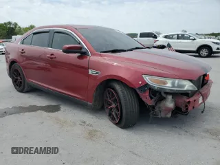 2015 Ford Taurus SEL with VIN 1FAHP2E87FG187946, listed as a Copart auction lot 53481575 with 119,746 mi miles and Salvage Title. Bid and sale history available at carsss.com. Image 4.