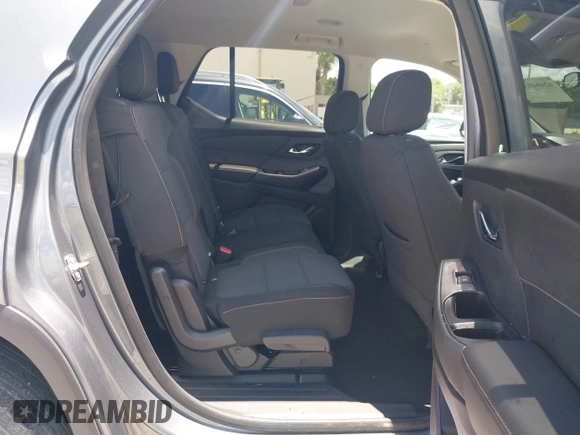2018 Chevrolet Traverse LS z VIN 1GNEVFKW0JJ202173, wystawiony jako IAAI lot #42494931 z przebiegiem 85 209 mil mil oraz . Historia ofert i sprzedaży dostępna na DreamBid. Obrazek 8.
