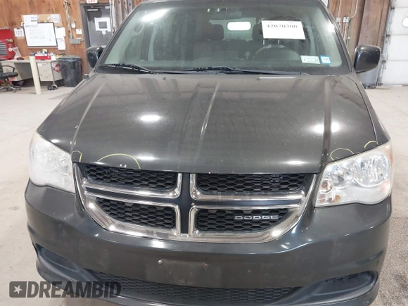 2012 Dodge Grand Caravan SXT with VIN 2C4RDGCG4CR224850, listed as a IAAI auction lot 42070300 with 177,982 mi miles and . Bid and sale history available at DreamBid. Image 13.