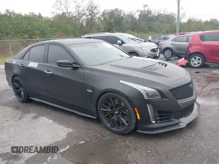 2018 Cadillac CTS-V z VIN 1G6A15S66J0156807, wystawiony jako IAAI lot #40770734 z przebiegiem 44 306 mil mil oraz . Historia ofert i sprzedaży dostępna na DreamBid. Obrazek 1.