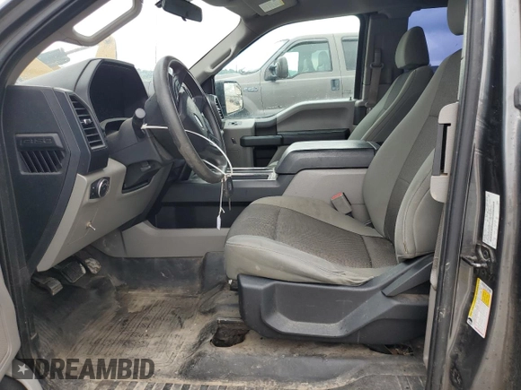 2016 Ford F-150 XLT with VIN 1FTFX1EF5GFD10399, listed as a Copart auction lot 60110165 with 145,374 mi miles and Salvage title. Bid and sale history available at DreamBid. Image 7.