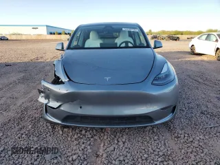 2024 Tesla Model Y Long Range z VIN 7SAYGAEEXRF211507, wystawiony jako Copart lot #56432715 z przebiegiem Nie podano mil oraz Szkoda całkowita • Salvage title. Historia ofert i sprzedaży dostępna na DreamBid. Obrazek 5.