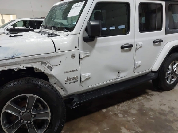 2021 Jeep Wrangler Unlimited Sahara with VIN 1C4HJXEG2MW655357, listed as a IAAI auction lot 41724695 with 37,644 mi miles and . Bid and sale history available at DreamBid. Image 6.