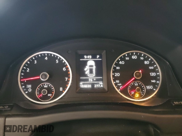 2013 Volkswagen Tiguan SE with VIN WVGBV7AX4DW518545, listed as a Copart auction lot 64585175 with 104,030 mi miles and Salvage title. Bid and sale history available at DreamBid. Image 9.