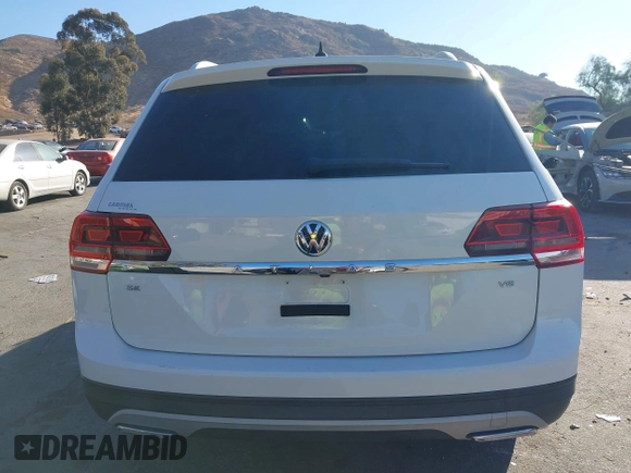 2018 Volkswagen Atlas SE с VIN 1V2DR2CA9JC551484, выставлен на аукционе IAAI как лот 41262713 с пробегом 59 054 миль миль и . История ставок и продаж доступна на DreamBid. Изображение 17.