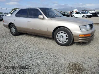 1995 Lexus LS 400 z VIN JT8UF22E3S0009474, wystawiony jako Copart lot #56906185 z przebiegiem 225 087 mil mil oraz Tytuł czysty. Historia ofert i sprzedaży dostępna na DreamBid. Obrazek 4.