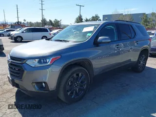 2021 Chevrolet Traverse RS z VIN 1GNEVJKW9MJ142868, wystawiony jako IAAI lot #41605218 z przebiegiem 76 806 mil mil oraz . Historia ofert i sprzedaży dostępna na DreamBid. Obrazek 2.