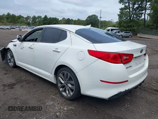 2014 Kia Optima SXL Turbo with VIN 5XXGR4A65EG263055, listed as a IAAI auction lot 40468453 with 93,494 mi miles and . Bid and sale history available at DreamBid. Image 3.