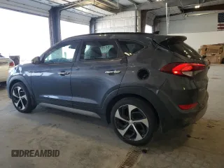 2017 Hyundai Tucson Sport with VIN KM8J3CA20HU594697, listed as a Copart auction lot 54252355 with 98,696 mi miles and Salvage Title. Bid and sale history available at DreamBid. Image 2.