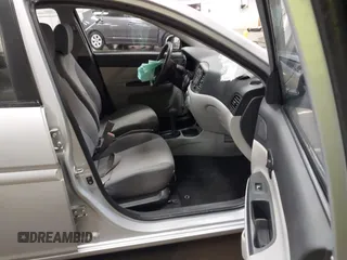 2011 Hyundai Accent GLS z VIN KMHCN4AC1BU605828, wystawiony jako IAAI lot #42129829 z przebiegiem 154 224 mil mil oraz . Historia ofert i sprzedaży dostępna na DreamBid. Obrazek 5.