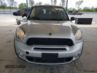 2014 MINI Countryman S with VIN WMWZC3C56EWP29211, listed as a Copart auction lot 52521145 with 91,396 mi miles and Salvage title. Bid and sale history available at DreamBid. Image 5.