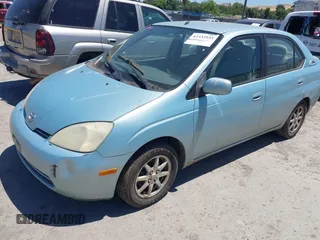 2003 Toyota Prius z VIN JT2BK12U130071262, wystawiony jako IAAI lot #42333933 z przebiegiem 314 553 mil mil oraz . Historia ofert i sprzedaży dostępna na DreamBid. Obrazek 2.