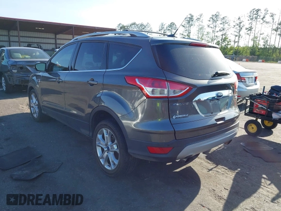 2016 Ford Escape Titanium with VIN 1FMCU9J94GUA63359, listed as a IAAI auction lot 41954514 with 94,315 mi miles. Bid and sale history available at carsss.com. Image 3.