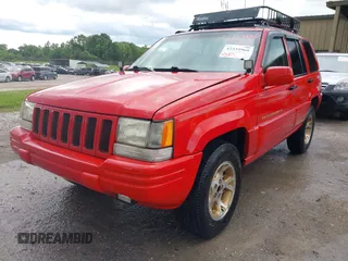 1996 Jeep Grand Cherokee Limited with VIN 1J4GZ78YXTC295872, listed as a IAAI auction lot 42339960 with 265,609 mi miles and . Bid and sale history available at DreamBid. Image 2.
