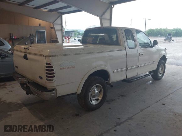 1997 Ford F-150 XL with VIN 1FTDX1861VNA65140, listed as a IAAI auction lot 42086211 with 412,065 mi miles. Bid and sale history available at carsss.com. Image 4.