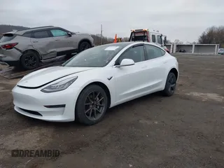 2020 Tesla Model 3 Standard Range Plus with VIN 5YJ3E1EA7LF659172, listed as a IAAI auction lot 42017026 with 32,104 mi miles. Bid and sale history available at carsss.com. Image 20.