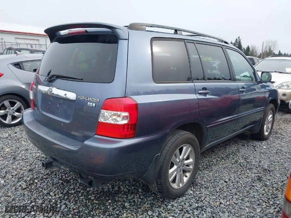 2006 Toyota Highlander Hybrid with VIN JTEEW21A260023243, listed as a IAAI auction lot 41778209 with 230,228 mi miles. Bid and sale history available at carsss.com. Image 4.