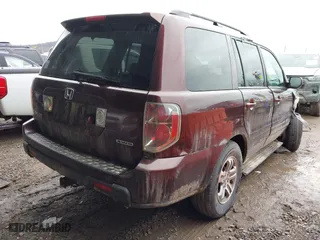 2007 Honda Pilot EX-L with VIN 2HKYF18767H538286, listed as a IAAI auction lot 41473762 with 239,429 mi miles. Bid and sale history available at carsss.com. Image 4.
