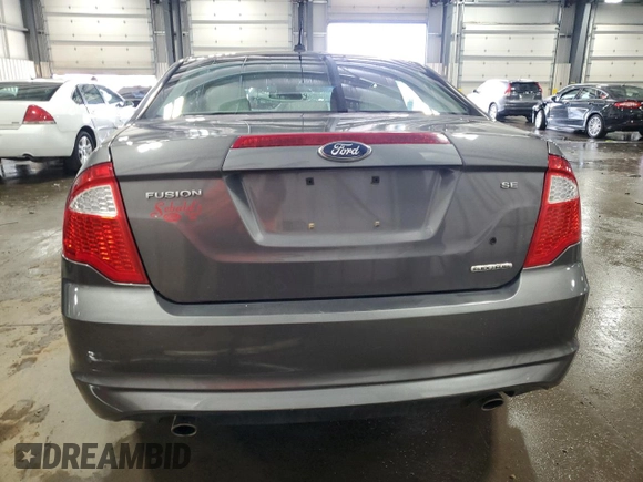 2012 Ford Fusion SE with VIN 3FAHP0HG9CR323277, listed as a Copart auction lot 59501005 with 84,658 mi miles and Salvage title. Bid and sale history available at DreamBid. Image 6.