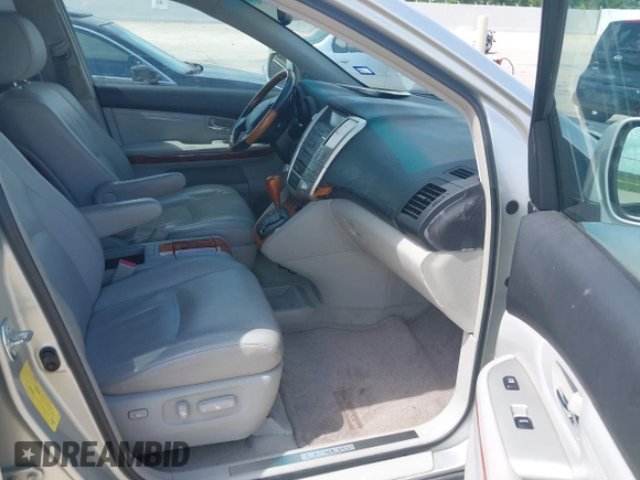 2007 Lexus RX 350 z VIN 2T2GK31UX7C011403, wystawiony jako IAAI lot #42432503 z przebiegiem 167 371 mil mil oraz . Historia ofert i sprzedaży dostępna na DreamBid. Obrazek 5.