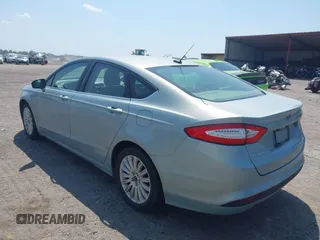 2014 Ford Fusion SE Hybrid with VIN 3FA6P0LU8ER251057, listed as a IAAI auction lot 42150589 with 188,192 mi miles and . Bid and sale history available at DreamBid. Image 3.