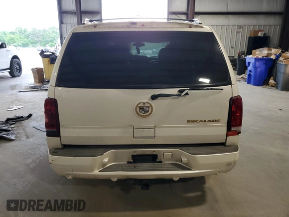 2004 Cadillac Escalade z VIN 1GYEK63N94R252528, wystawiony jako Copart lot #54253175 z przebiegiem Nie podano mil oraz Szkoda całkowita • Salvage title. Historia ofert i sprzedaży dostępna na DreamBid. Obrazek 6.