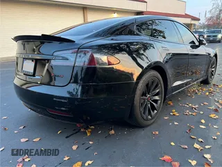 2017 Tesla Model S 60 with VIN 5YJSA1E15HF219286, listed as a Copart auction lot 84771024 with 43,259 mi miles and Salvage title. Bid and sale history available at DreamBid. Image 4.