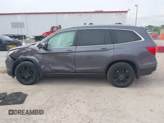 2017 Honda Pilot EX-L with VIN 5FNYF6H53HB038128, listed as a IAAI auction lot 42300311 with 176,928 mi miles and . Bid and sale history available at DreamBid. Image 14.