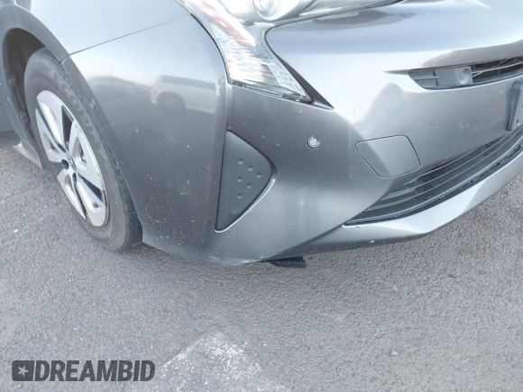 2018 Toyota Prius Two with VIN JTDKBRFU6J3582025, listed as a IAAI auction lot 41681244 with 77,504 mi miles and . Bid and sale history available at carsss.com. Image 6.