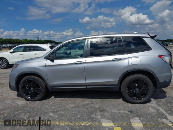 2021 Honda Passport Sport with VIN 5FNYF8H24MB004016, listed as a IAAI auction lot 41696379 with 85,373 mi miles and . Bid and sale history available at DreamBid. Image 14.