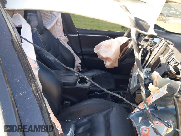 2016 Tesla Model S 90D with VIN 5YJSA1E42GF143731, listed as a IAAI auction lot 41394839 with Not provided miles and . Bid and sale history available at DreamBid. Image 5.