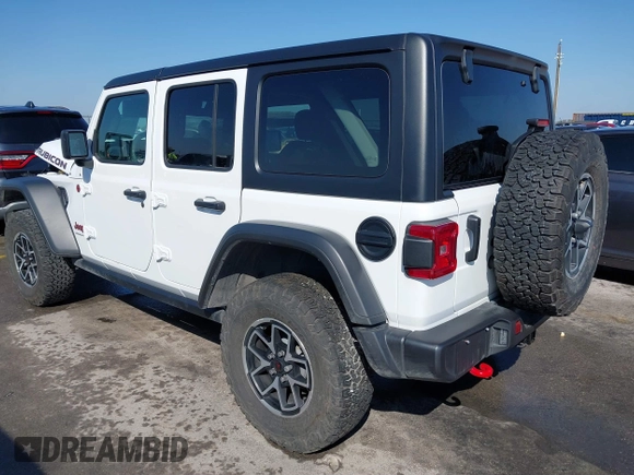 2024 Jeep Wrangler Rubicon with VIN 1C4PJXFG6RW291185, listed as a IAAI auction lot 41773050 with 12,400 mi miles and . Bid and sale history available at DreamBid. Image 3.