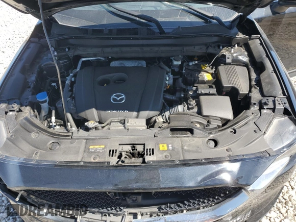 2021 Mazda CX-5 Touring z VIN JM3KFBCM5M0438706, wystawiony jako Copart lot #52048075 z przebiegiem 50 288 mil mil oraz Szkoda całkowita • Salvage title. Historia ofert i sprzedaży dostępna na DreamBid. Obrazek 14.