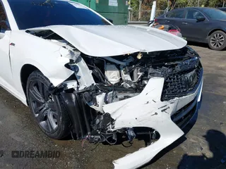 2022 Acura TLX w/A-Spec Package with VIN 19UUB6F52NA002062, listed as a IAAI auction lot 41853469 with 77,301 mi miles and . Bid and sale history available at DreamBid. Image 6.