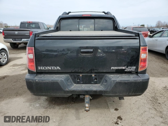 2009 Honda Ridgeline RTL with VIN 2HJYK165X9H002865, listed as a Copart auction lot 52682515 with 260,785 mi miles and Clean Title. Bid and sale history available at carsss.com. Image 6.