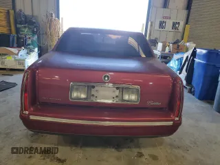 1998 Cadillac DeVille with VIN 1G6KD54YXWU719609, listed as a Copart auction lot 83112704 with 154,627 mi miles and Salvage Title. Bid and sale history available at carsss.com. Image 6.