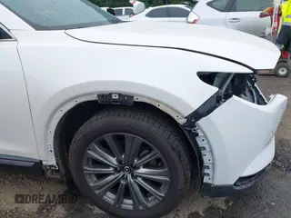 2021 Mazda CX-9 Signature with VIN JM3TCBEY4M0517118, listed as a IAAI auction lot 42400675 with 56,260 mi miles and . Bid and sale history available at DreamBid. Image 18.