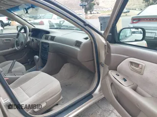 2000 Toyota Camry CE z VIN 4T1BG22K6YU620043, wystawiony jako IAAI lot #42425130 z przebiegiem 157 080 mil mil oraz . Historia ofert i sprzedaży dostępna na DreamBid. Obrazek 5.