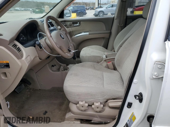 2005 Kia Sportage LX with VIN KNDJF723057125954, listed as a Copart auction lot 79454554 with 179,811 mi miles and Salvage Title. Bid and sale history available at carsss.com. Image 7.