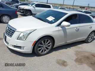 2013 Cadillac XTS Premium z VIN 2G61S5S33D9235025, wystawiony jako IAAI lot #42288742 z przebiegiem 180 221 mil mil oraz . Historia ofert i sprzedaży dostępna na DreamBid. Obrazek 2.