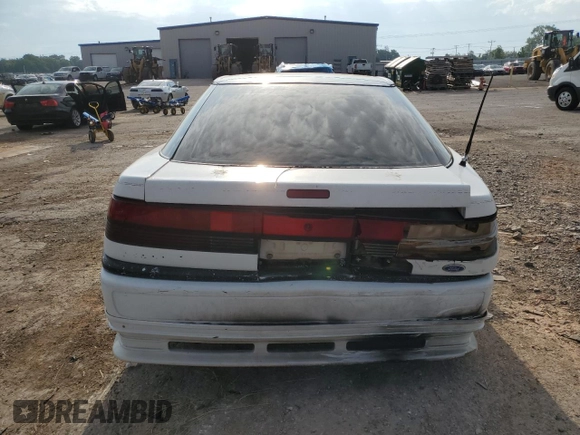 1990 Ford Probe GL z VIN 1ZVPT20CXL5212307, wystawiony jako Copart lot #54941994 z przebiegiem 241 227 mil mil oraz Szkoda całkowita • Salvage title. Historia ofert i sprzedaży dostępna na DreamBid. Obrazek 6.