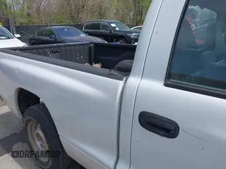 2001 Dodge Dakota with VIN 1B7FL26XX1S249462, listed as a IAAI auction lot 42003993 with 228,398 mi miles. Bid and sale history available at carsss.com. Image 8.