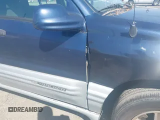 2002 Chevrolet Tracker LT z VIN 2CNBE634426952677, wystawiony jako IAAI lot #42009744 z przebiegiem 243 692 mil mil oraz . Historia ofert i sprzedaży dostępna na DreamBid. Obrazek 6.