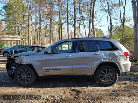 2016 Jeep Grand Cherokee Limited 75th Anniversary with VIN 1C4RJFBT9GC400873, listed as a IAAI auction lot 41834112 with 110,457 mi miles and . Bid and sale history available at DreamBid. Image 14.